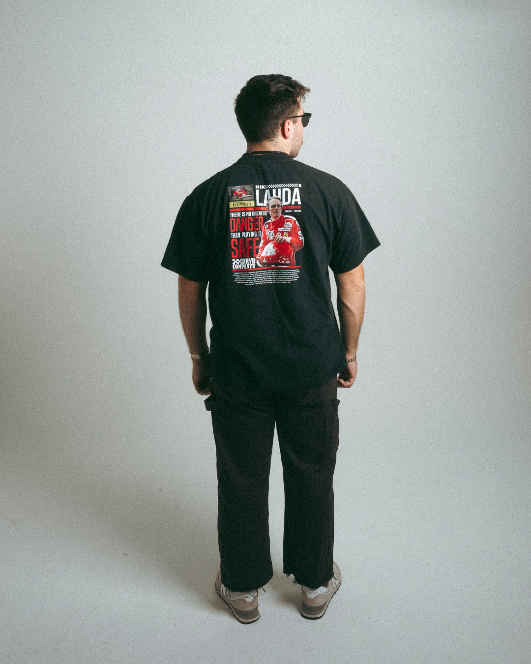 Man posing with black  Niki Lauda shirt back