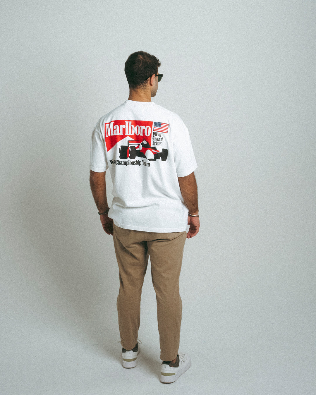 Man wearing white heavyweight racing shirt
