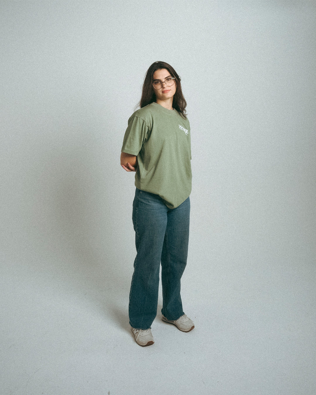 Woman wearing green heavyweight