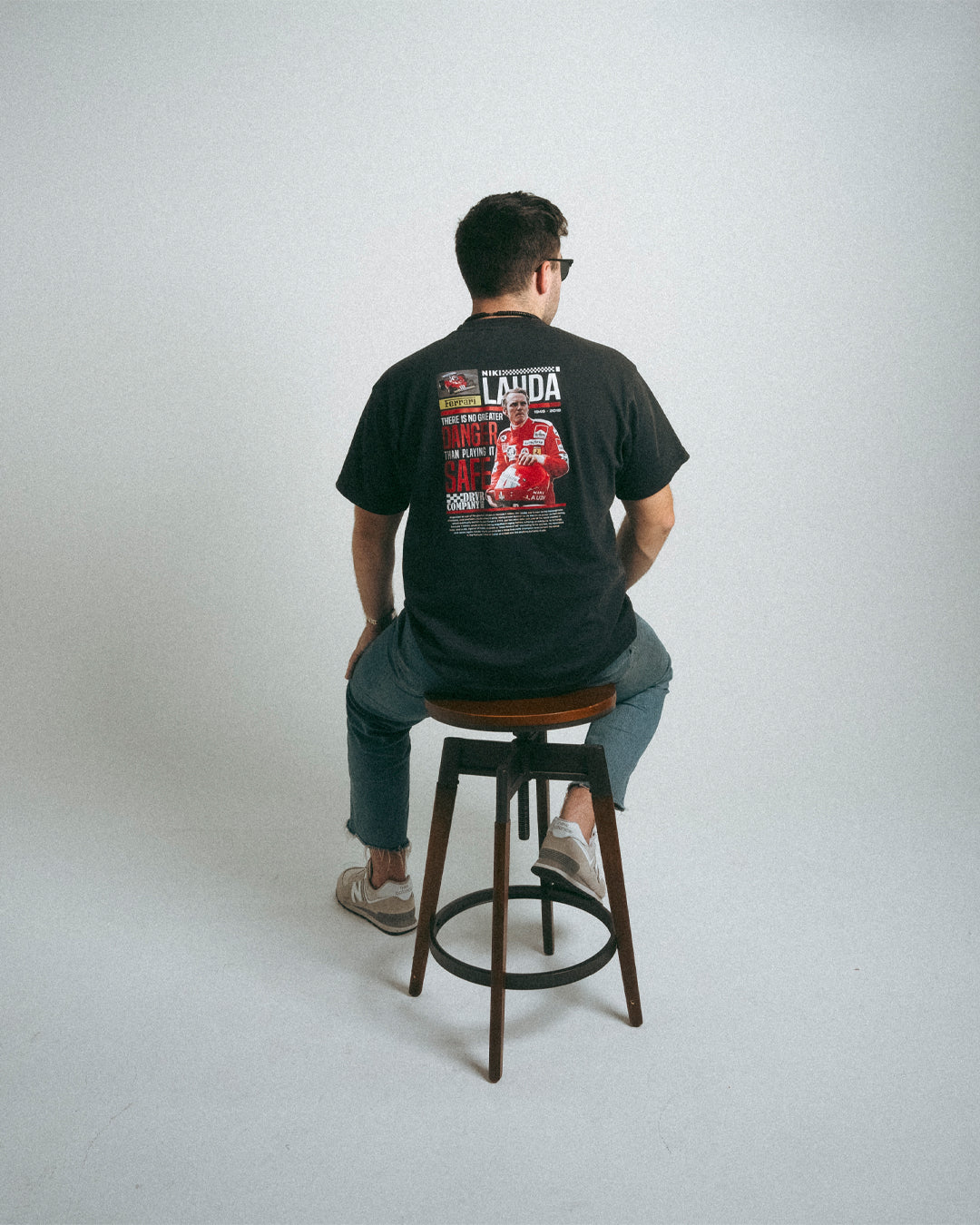 Man wearing black racing shirt