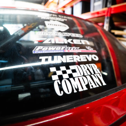 Red car with stickers on back