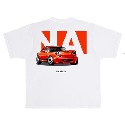 White t-shirt with a red car graphic and 'NA' text on a white background